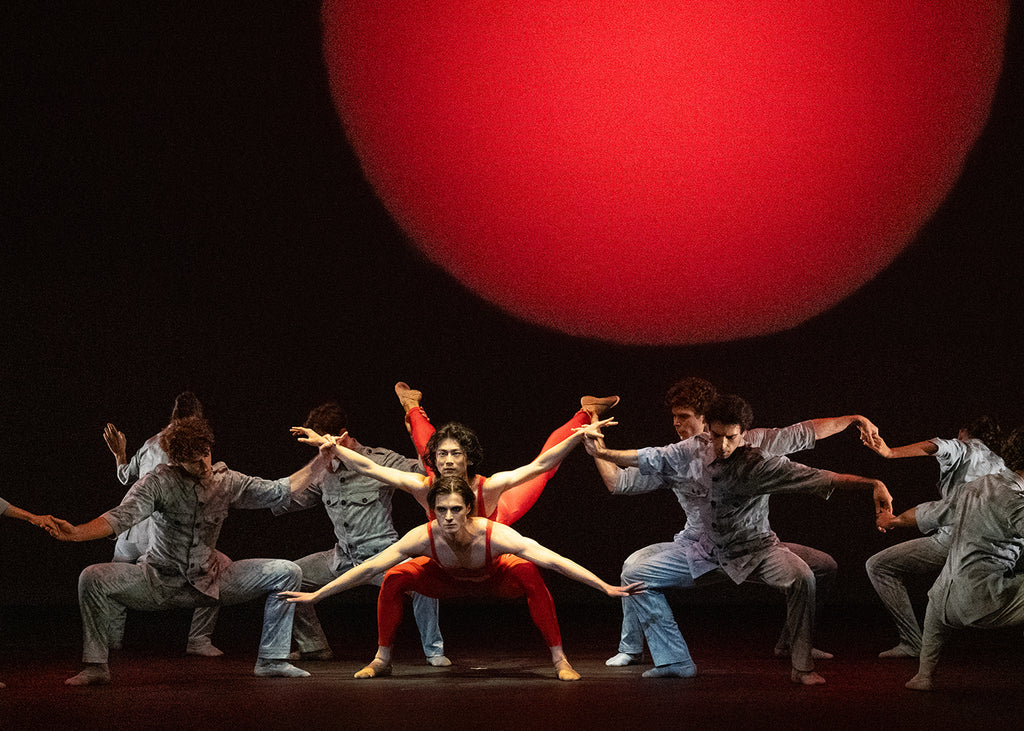 Konosuke Takeoka and dancers of Béjart Ballet Lausanne in “The Firebird” by Maurice Béjart. Photograph Steven Pisano