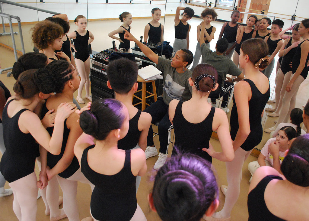 Ballet Tech artistic director Dionne Figgins with students. Photograph by Joe Rayome