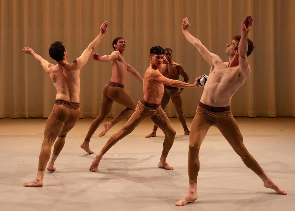 Jose Manuel Esteban (center), Lucas Sverdlen (left), Julian Myrland, Eddy Trimiño,
and Jeffrey Shirbroun (right) in “Secular Games”(“Play with thought- on a Socratic Island”) by Martha Graham. Photograph by Brian Pollock