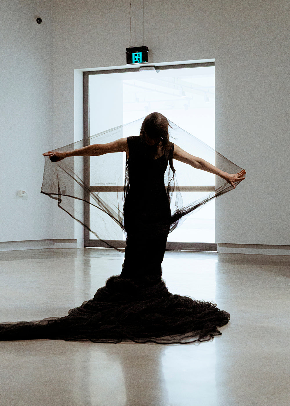 Lucy Guerin in “Place Dances.” Photograph by Gianna Rizzo